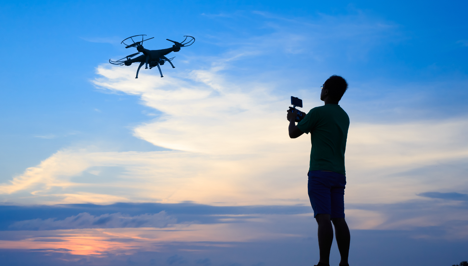 Land surveyors reviewing LiDAR drone mapping data to compare buying, subscription, and outsourcing options for survey-grade deliverables.
